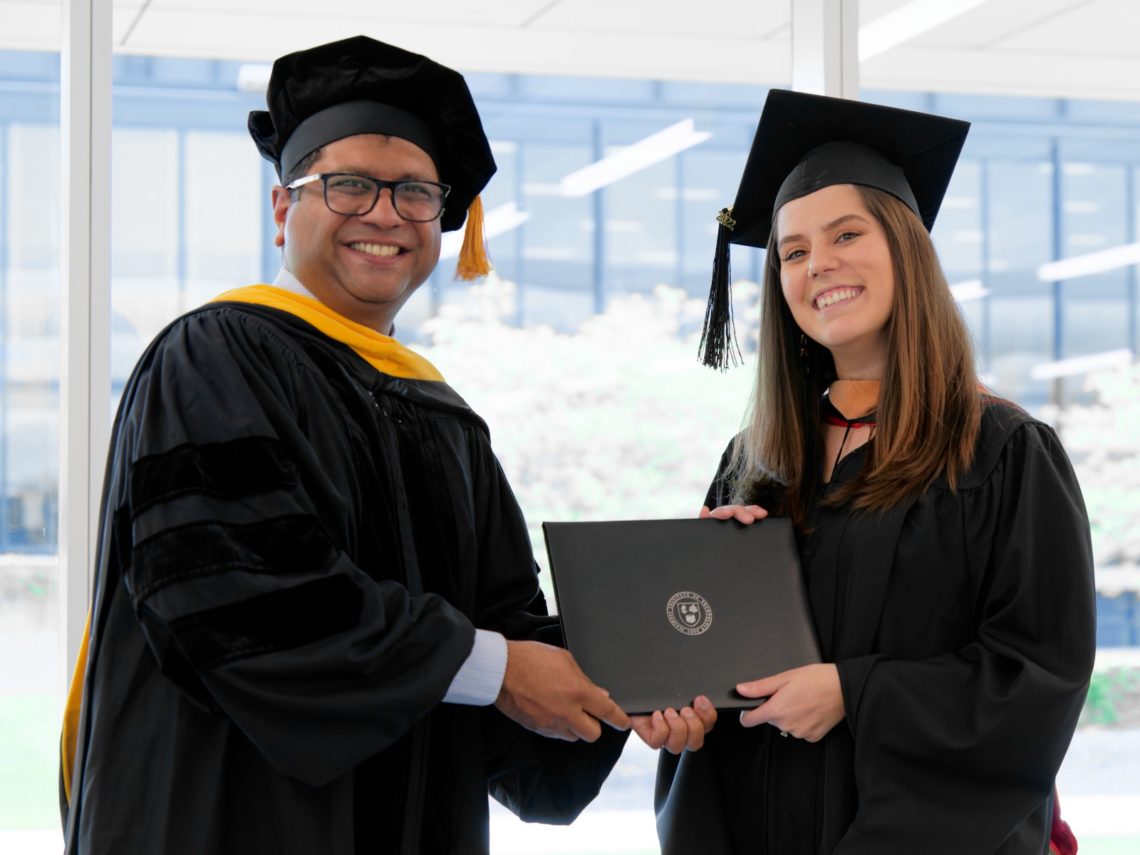 Monica Villazon San Martin receiving her diploma