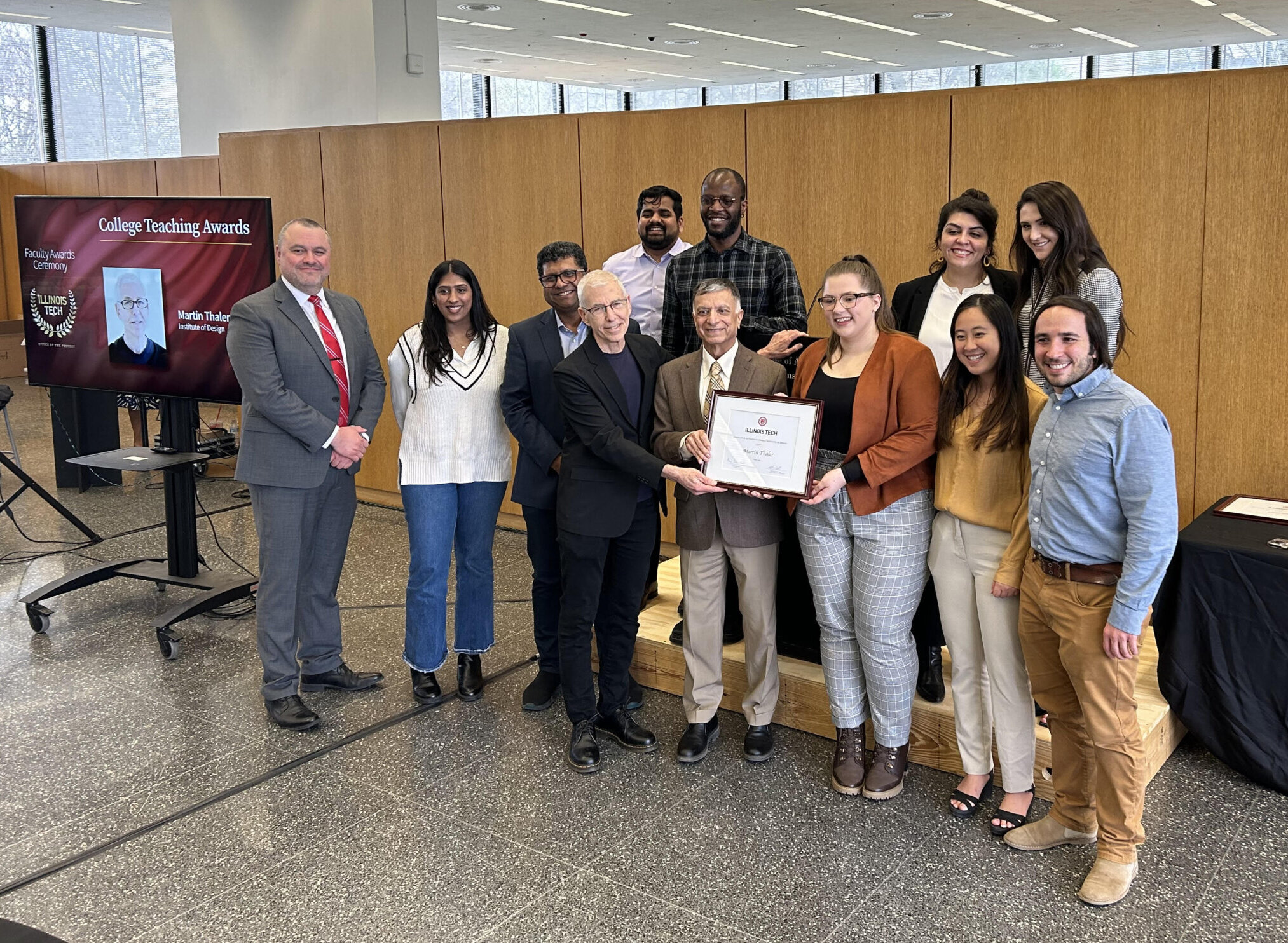 Martin Thaler shown with students upon receiving Illinois Tech Excellence in Teaching Award