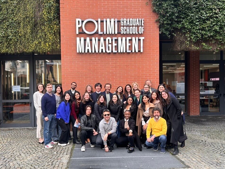 A diverse group of students outside PoliMi Graduate School of Management.